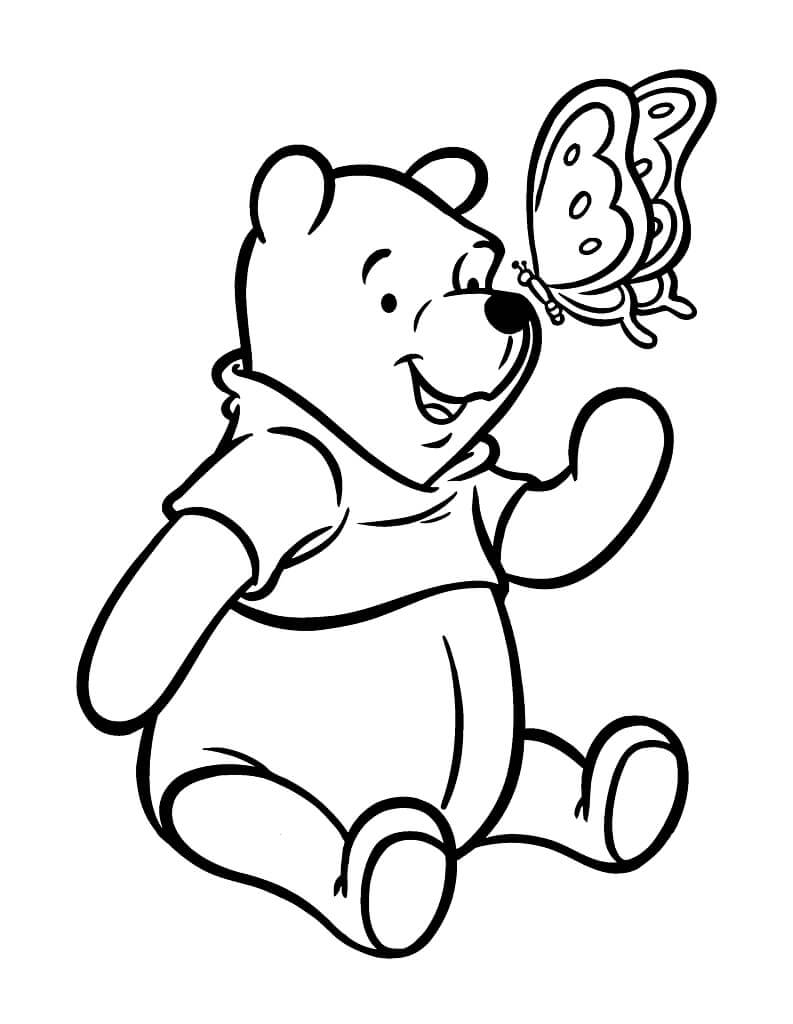 Desenho do Ursinho Pooh Brincando com Borboleta no Jardim para Colorir